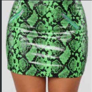 Sexy hot Lime green and black print mini skirt with  2 zippered pockets